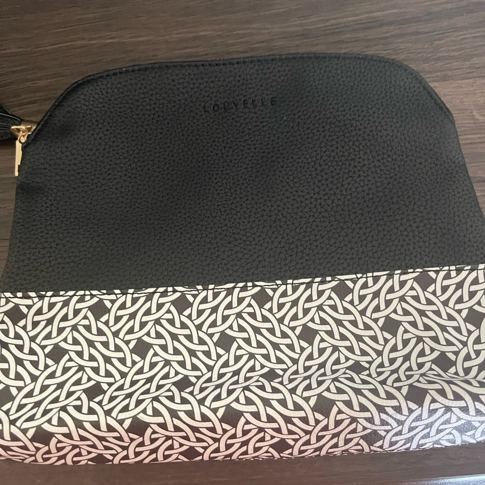 BRAND NEW- never used! LOUVELLE CLUTCH
